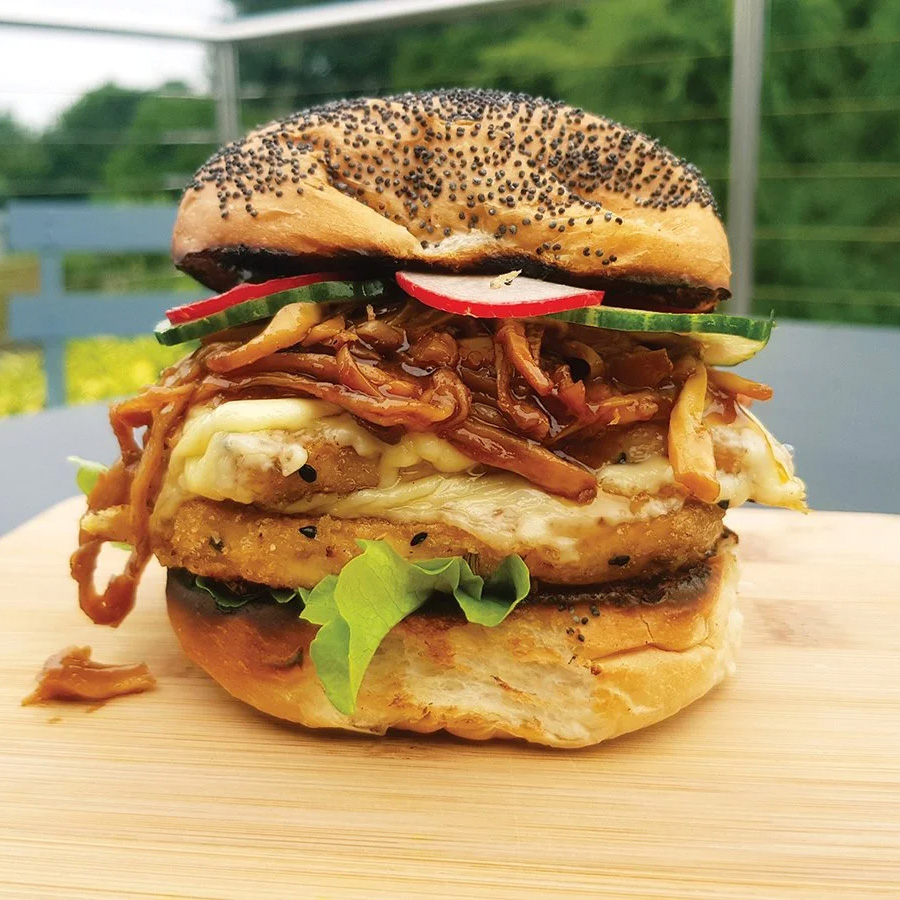 This is a great burger that combines texture and flavour from the crispy coated tofu and sweet, sticky pulled king oysters
