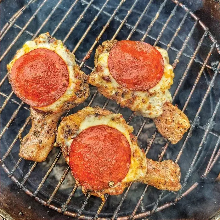 What do you get when you cross a chicken drumstick with a pizza?