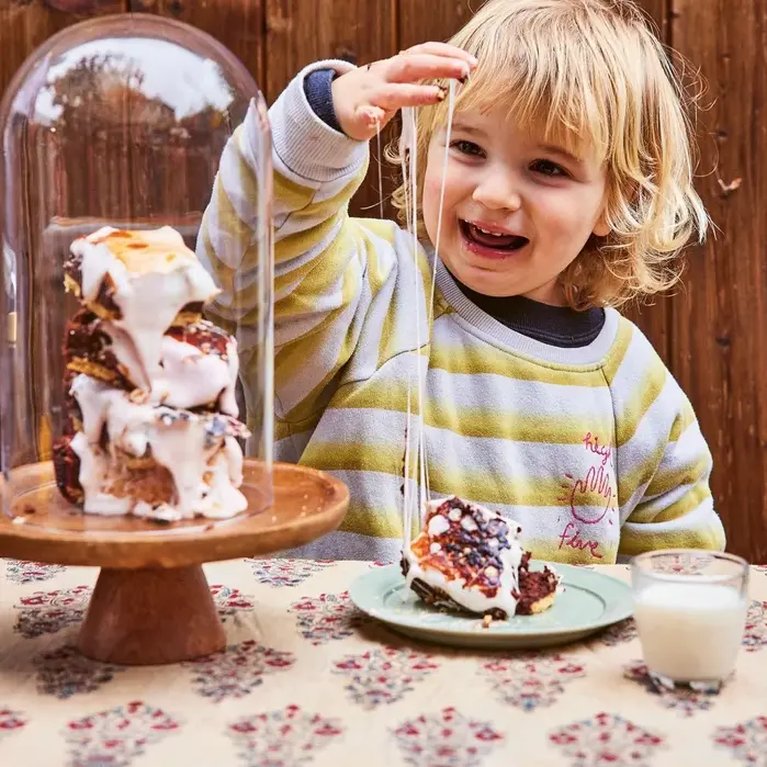 Indulge in DJ BBQ's S'mores Brownies, a delectable treat to serve 12-15. Bake in a wood-fired oven at 180°C with love and enjoy!