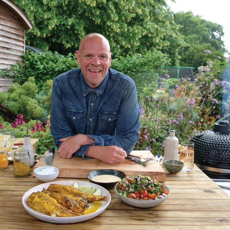 If you can't stand the heat, get out of the kitchen and closer to the fire. And that’s just what top chef Tom Kerridge has done, as RUPERT BATES discovers