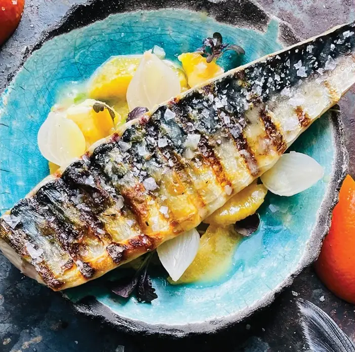 Discover Dan Cooper's unique BBQ recipe for a warm mackerel salad with orange. Packed with flavour, it’s a fresh spin on traditional barbecue cuisine.