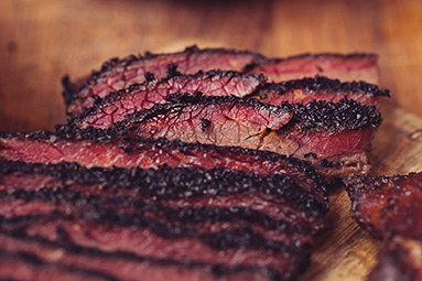 Texas born and bred, ROBIN PERRIS is a third generation pitmaster from Taylor, now living in England with her family in Cumbria, running the Kendal smokehouse and restaurant Pappy’s Texas BBQ.