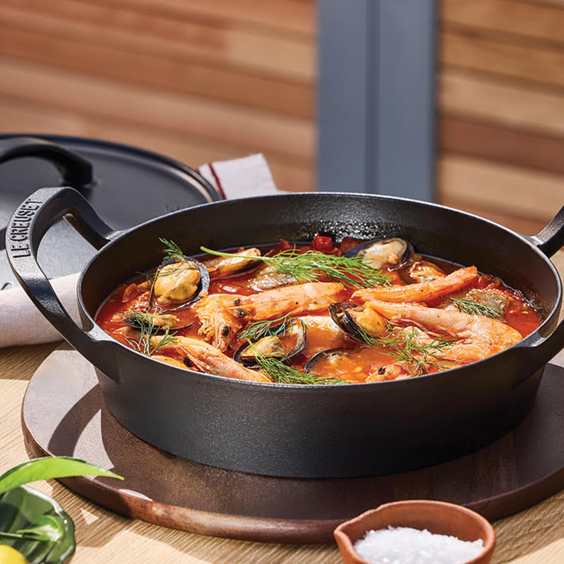 If you have come this far into BBQ season only to have pulled out grilling gear from years gone by and realise it needs a bit of a refresh, Le Creuset has released some new pieces into its outdoor cooking collection that will see you through your summer grilling for years to come.